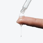 Go Deep Reale Actives Dropper with product dripping onto a finger